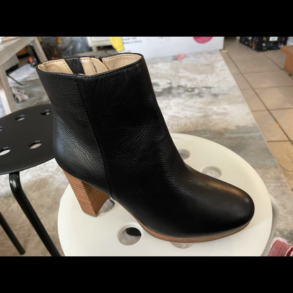 Never worn black boots.